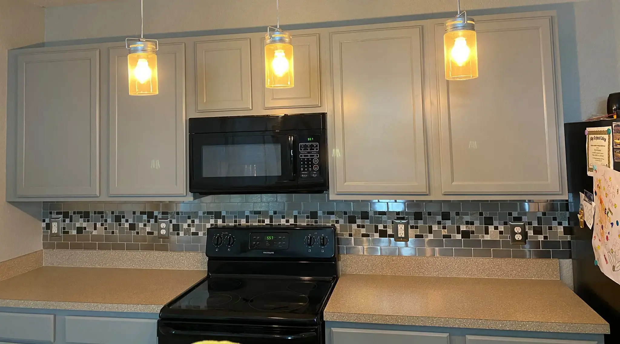 Beautifully Refinished Kitchen Cabinets